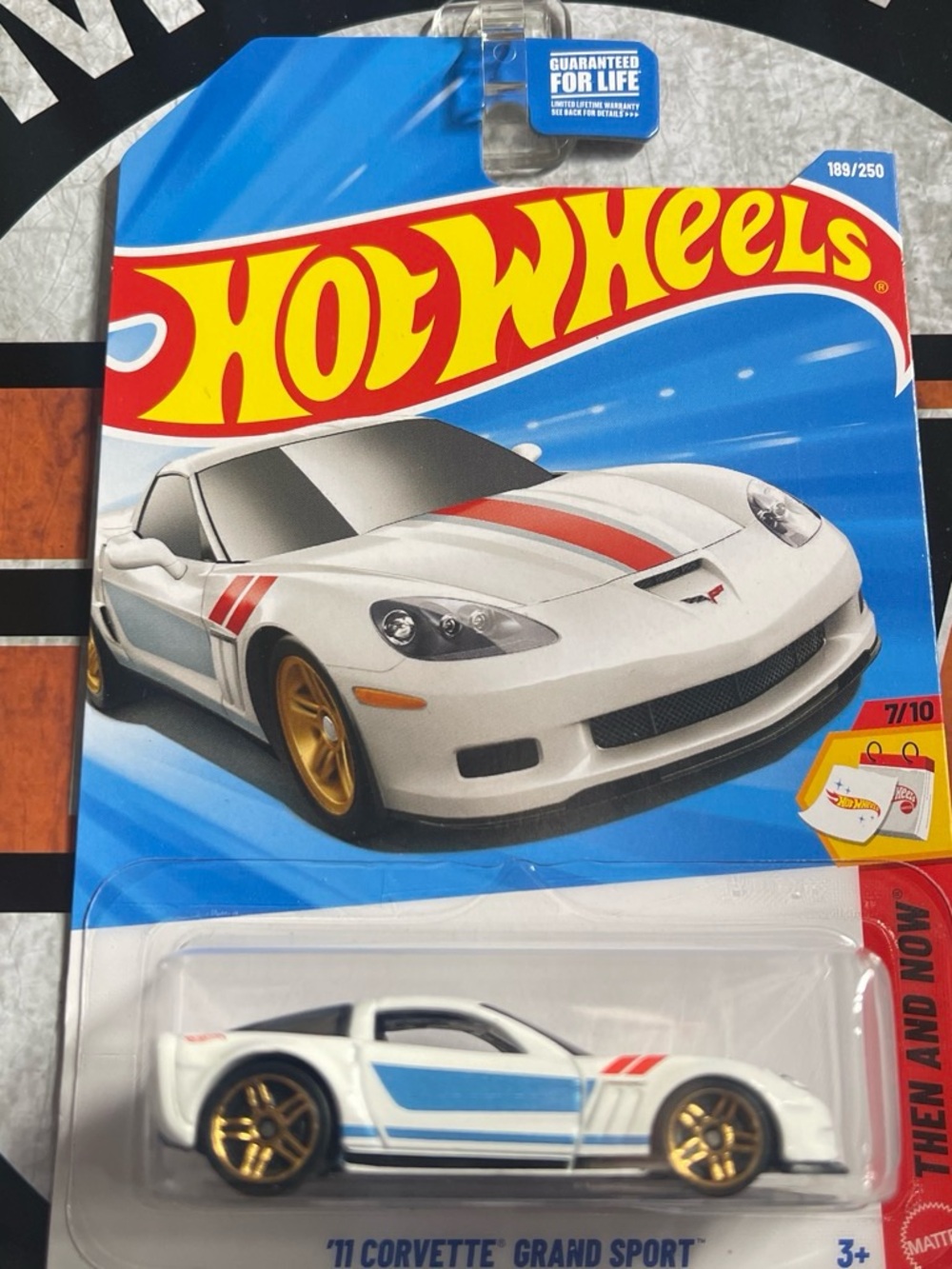 Hot Wheels '11 Corvette Grand Sport Toy Car - White with Blue & Red Accents
